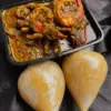 bangaSoup Banga Soup with beef, cow leg, fish, and kpomo – served with Eba, Fufu, or Wheat – Nigerian meal delivery