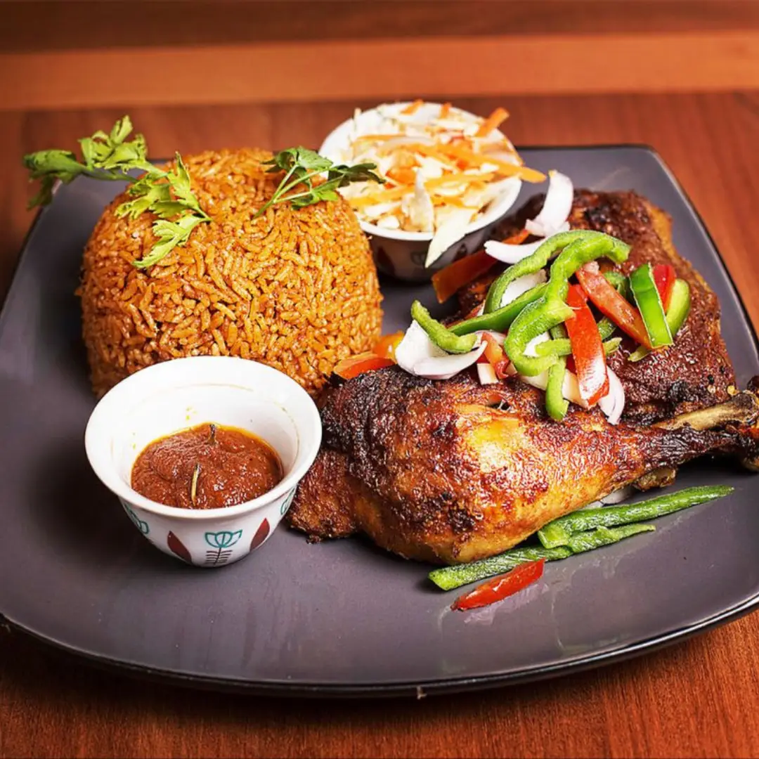 jollofRice Nigerian Jollof rice with chicken and fried plantain – Lagos food delivery