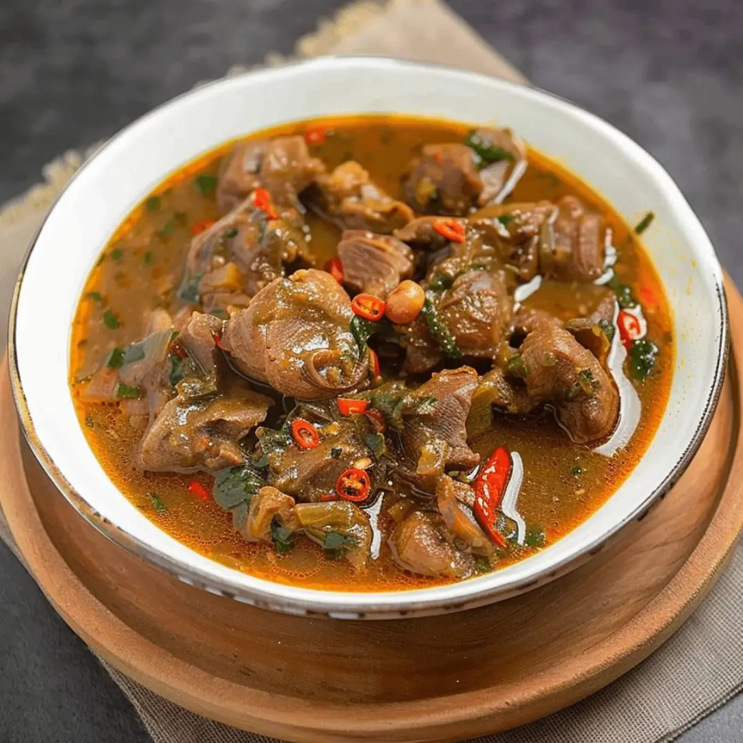 pepperSoup Nigerian pepper soup with beef, cow leg, fish and kpomo – hot spicy pepper soup Texas